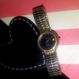 Vanity Fair Watch Silver and Gold Toned Expansion Band Stretchy Elegant